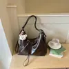 Bolsa casual nicho estilo coreano, nova bolsa tote de moda verão 2026, alta aparência, bolsa de ombro de grande capacidade para o dia a dia
