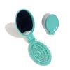 Espejo de maquillaje portátil de color sólido con forma de peine hueco, espejo plegable portátil integrado, peine de bolsillo de viaje especial para mujer con espejo