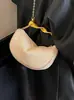 Yuezi 2026 Moda Verão Nova Bolsa Transversal de Ombro Único Design Versátil Bolsa de Axila Bolsa de Mão Formato Bolinho
