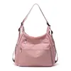 Bolso de ocio multifuncional de nailon para usar en la espalda y al hombro, nuevo modelo 2026, bolso de gran capacidad para debajo del brazo, bolso de hombro deportivo versátil