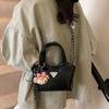 Bolsa de Mão Explosiva Transfronteiriça Feminina 2025 Início da Primavera Nova Chegada Corrente Versátil Bolsa de Ombro Senso de Alta Qualidade Bolsa Balde Transversal