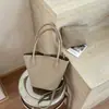 Bolso Shuai Mi Jia, color liso, elegante, nuevo modelo 2026, bolso de hombro casual, bolso de axila de moda, bolso cubo tejido para el día a día