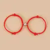 Pulsera de pareja con atracción magnética Runxin, moda simple, pulsera de empuje y extracción, cuerda de mano de Milán para comercio exterior transfronterizo de Europa y Estados Unidos