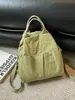 Bolso de hombro ligero Yuezhi 2026 principios de otoño con cordón, bolso tote casual de moda para ir al trabajo y la escuela