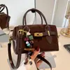 Bolso de hombro de nicho súper popular transfronterizo para mujer, nuevo bolso cruzado de moda de alta gama para el verano 2026, exquisito bolso tipo almohada