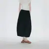 Falda larga plisada versátil de cintura elástica con capullo de flor tridimensional blanco para mujer, verano simple y versátil, línea A aireada