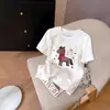 Camiseta de Manga Corta con Estampado de Letras de Pony de Dibujos Animados de Diseño Europeo para Mujer, Nueva Versátil de Cuello Redondo Primavera 2026