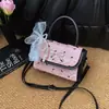 2025 Laço Casual Moda Verão Novo Estilo Design Simples Formato de Coração Elegante Bolsa de Ombro Único para Mulheres