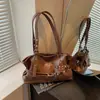 Colección de otoño 2026 transfronteriza: bolso de mano de diseño único, gran capacidad, moderno y casual, con una textura única y un diseño elegante, bolso de hombro para mujer
