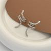 Arete clip de hueso para la oreja con forma de serpiente de alta calidad personalizado, aretes sin perforación, diseño de temperamento de lujo ligero, estilo frío, clip para la oreja de circonita