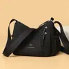 Bolso de mujer nuevo simple versátil bandolera gran capacidad multi-compartimento bolso cruzado moda retro bolso de mamá mujer