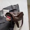 Bolso Cruzado de Otoño 2025 Nuevo Retro Color Puro Alto Valor Moderno Bolso Dumpling Moderno Bolso de Hombro Axila