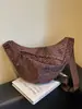Bolso súper popular de nicho con estampado de leopardo para mujer, nuevo bolso cruzado de moda versátil 2026, exquisito mini bolso de cuerno, bolso tipo empanada