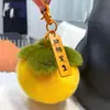 Pele de coelho Rex imitação coisa boa acontecer chaveiro pingente boa Caqui acontecer bola de pelúcia mochila bolsa decoração para pendurar pingente de Caqui feminino