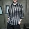 Camisa listrada de manga média masculina 2024 Nova camisa masculina de sete mangas Camisa listrada de algodão e linho de manga média Jaqueta fina para homens