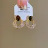 Brincos Olho de Tigre Estilo Melanoid Retro Senso de Design de Nicho Brincos Versáteis Luxo Leve Moda de Alta Qualidade Brincos de Tarraxa para Mulheres