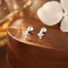 Aretes de Plata Pura S999 Lujo Ligero Estrella Natural de Cuatro Puntas Circonia Rosa con Tornillo para Mujer, Aretes de Estilo Fresco Elegante de Gama Alta al por Mayor
