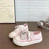 Zapatos de lona blancos lechosos de suela gruesa para mujer, nuevas zapatillas versátiles de primavera 2026 para estudiantes, zapatos blancos casuales transpirables