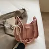 Bolso de mano para mujer simple y moderno estilo coreano, nuevo modelo primavera 2026, de alta calidad, elegante y con estilo, para llevar al hombro y cruzado