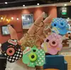 Celebridade da Internet Boneca Cartoon Multifuncional Chaveiro com Luz Piscante Calculadora Termômetro Pingente de Mochila Pequeno Presente Atacado