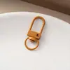 Broche de Puerta Pintado 32 mm Llavero en Forma de U Clip de Resorte para Perro Accesorio de Bolsa Juguete Clip para Colgar Piezas de Bricolaje Festival del Bote del Dragón 25 Colores