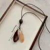 Collar con Colgante Largo Irregular Marrón para Mujer Nuevo Estilo Chino Retro Cordón Cadena para Suéter Accesorios de Cuello Alto de Gama