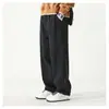 Pantalones casuales rectos de trabajo estilo primavera nuevo color sólido simples de pierna ancha para hombre holgados modernos combinables pantalones largos