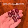 Arena púrpura y dorada de alto contenido natural pez dorado bebé pequeño valiente en la piel del tesoro descanso DIY pulsera accesorios cinabrio rojo mayoreo