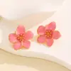 Europa y Estados Unidos pendientes transfronterizos color dulce ins flor de gota de aceite moda simples pendientes de flor de cinco pétalos tridimensionales pendientes
