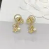 Modelo Novo Popular Mais Vendido da Dijia com Etiqueta e Texto, Estrela de Cinco Pontas, Pérola, Cd, Brincos e Conjunto de Colar Nariz de Porco Atacado