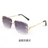 Gafas de sol de moda sin montura con borde cortado para mujer, Gafas de sol de estilo callejero de tendencia europea y americana de alta gama, Gafas de protección UV
