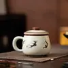 Taza de Oficina de Apsaras Voladoras de Dunhuang Taza de Cerámica Ru Kiln con Tapa Separación de Agua y Té Taza con Infusor de Té Taza de Gama Alta Souvenir