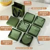 Caja de regalo de joyería de papel especial verde de alta gama, con diseño de tapa y base, adecuada para anillos, pulseras y otros artículos de joyería; se puede usar para envolver regalos en joyerías y se puede personalizar con un logotipo