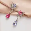 Brincos de Pérola Coreanos de Alta Qualidade 2026, Agulha de Prata Estilo Vintage Chanel Diamante Colorido Estrela de Oito Pontas Brincos de Tarraxa Atacado