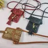 Venta al por mayor de fábrica moda estilo pequeño colgante de borla funda cruzada para teléfono tarjeta monedero multiusos de alta calidad