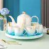 Juego de agua de vidrio cerámico de lujo nórdico, fantasía, esmalte de color, borde dorado, taza de café, juego para el té de la tarde con bandeja