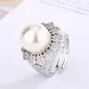 Novo Anel Huabi Jewelry 2023 Banhado a Platina Cobre Flor Redonda Pérola Feminino 14mm Atacado