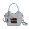 Bolso de mano muy elegante 2026, bolso de moda tejido, forma de cubo, alta gama, ligero, de un solo hombro, bolso cruzado para vacaciones, al por mayor