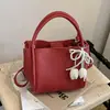 Moda Exquisita Transfronteriza Verano 2026 Nuevo Versátil para Viajar Diseño de Nicho Bolso Cubo de Hombro Cruzado de Alta Gama