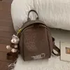 Mochila de Viaje con Estampado de Leopardo 2025 Nueva Nicho Retro Casual Ligera para Exteriores Viajes Pequeña Portátil para la Escuela