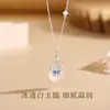 Foto real de Tiqia del Collar Mariposa de la Fortuna para mujer, plata de ley S925, nuevo estilo chino, lujo ligero, elegante colgante de calabaza de calcedonia blanca