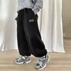 Calça Masculina Infantil 2026 Primavera e Outono Solta Longa Casual Moletom Nova Calça Esportiva para Uso ao Ar Livre Calça de Moletom Feminina