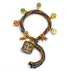 Pulseira do deus da riqueza de cinco vias estilo Xizang oito santos padroeiros cinco mestres Manjushri deus da riqueza amarelo thangka corda tecida à mão pulseira do ano desta vida