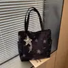 Bolsa de mano grande con estampado de estrellas, nueva bolsa de hombro casual 2026, bolso de mano para el trabajo, bolsa versátil para el antebrazo
