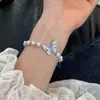 Pulsera de Perlas y Mariposas con Cuentas Estilo Francés Lujo Ligero Gama Alta Nuevo Diseño de Nicho Versátil Joyería de Pulsera Elegante