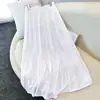 Saia de bolo em camadas com senso de design, saia feminina de primavera/verão com cintura elástica, modelagem que afina, barra ampla, comprimento médio/meio-comprimento, saia longa