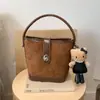 Bolso de Hombro de Moda Retro Nuevo Otoño e Invierno 2026 Transfronterizo, Bolso Cruzado Elegante, Bolso Tipo Cubo con Textura, Sensación de Alta Gama para Mujer