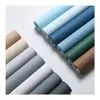 Papel pintado de color liso no tejido moderno y simple estilo nórdico para dormitorio sala de estar azul claro beige seda liso