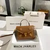 Dropshipping Bolsa de Mão Resistente com Rebites 2025 Nova Bolsa Quadrada Pequena de Cor Contrastante de Alta Qualidade Atacado