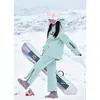 Conjunto de Macacão de Esqui Acolchoado e Espesso para Homens e Mulheres da Northeast Ski Resort, Estilo Casal Soltinho, Jaqueta e Calça de Esqui Impermeáveis e Quentes